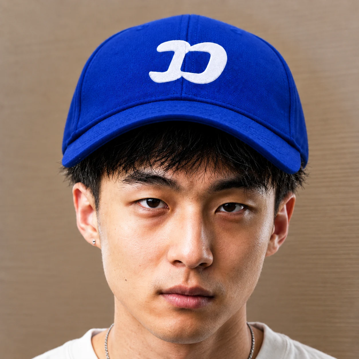 Kimchi Wif Fomo Cap wearing his signature electric-blue cap